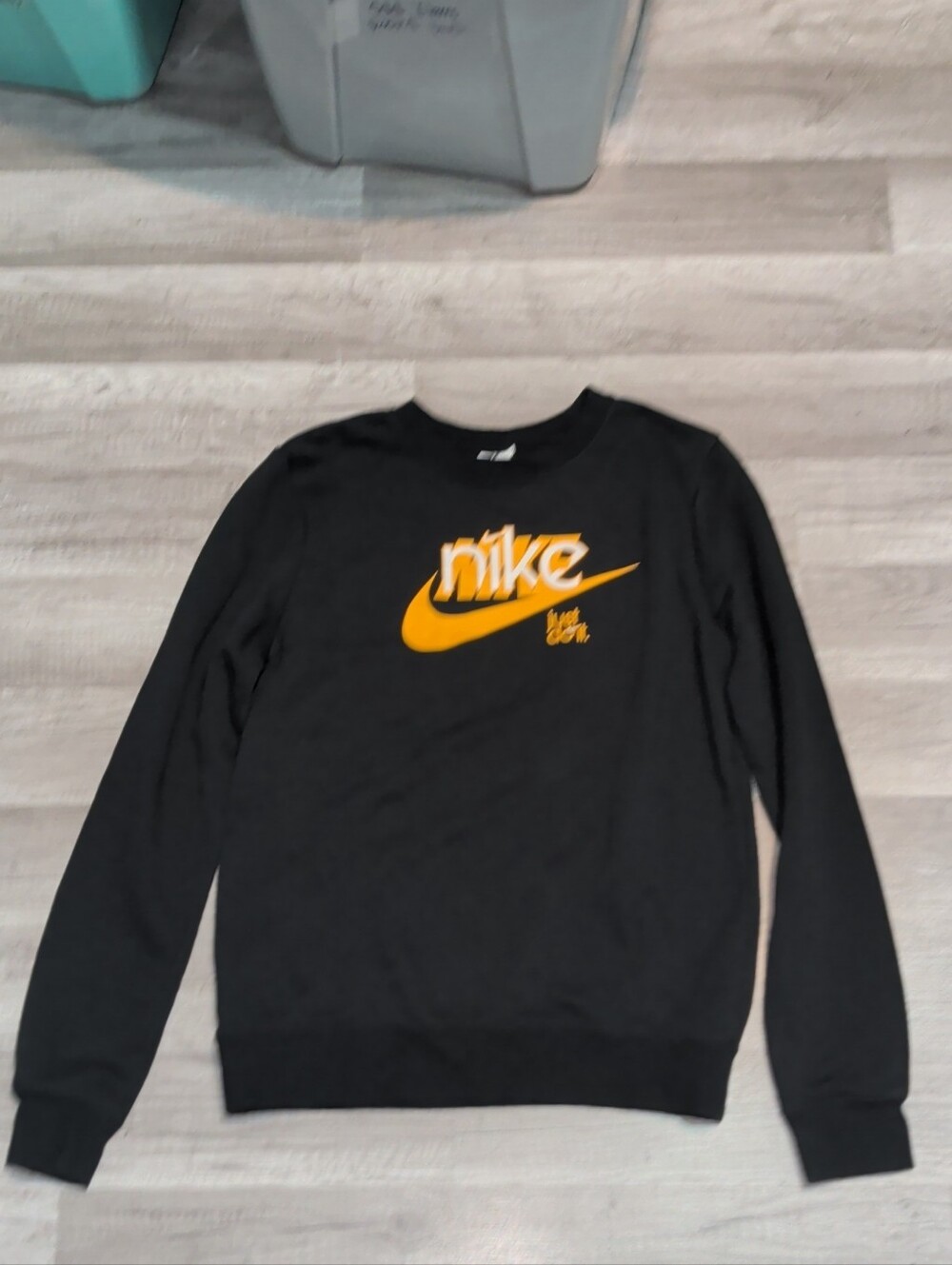 Nike Women's Black Crewneck with Yellow Swoosh Logo
